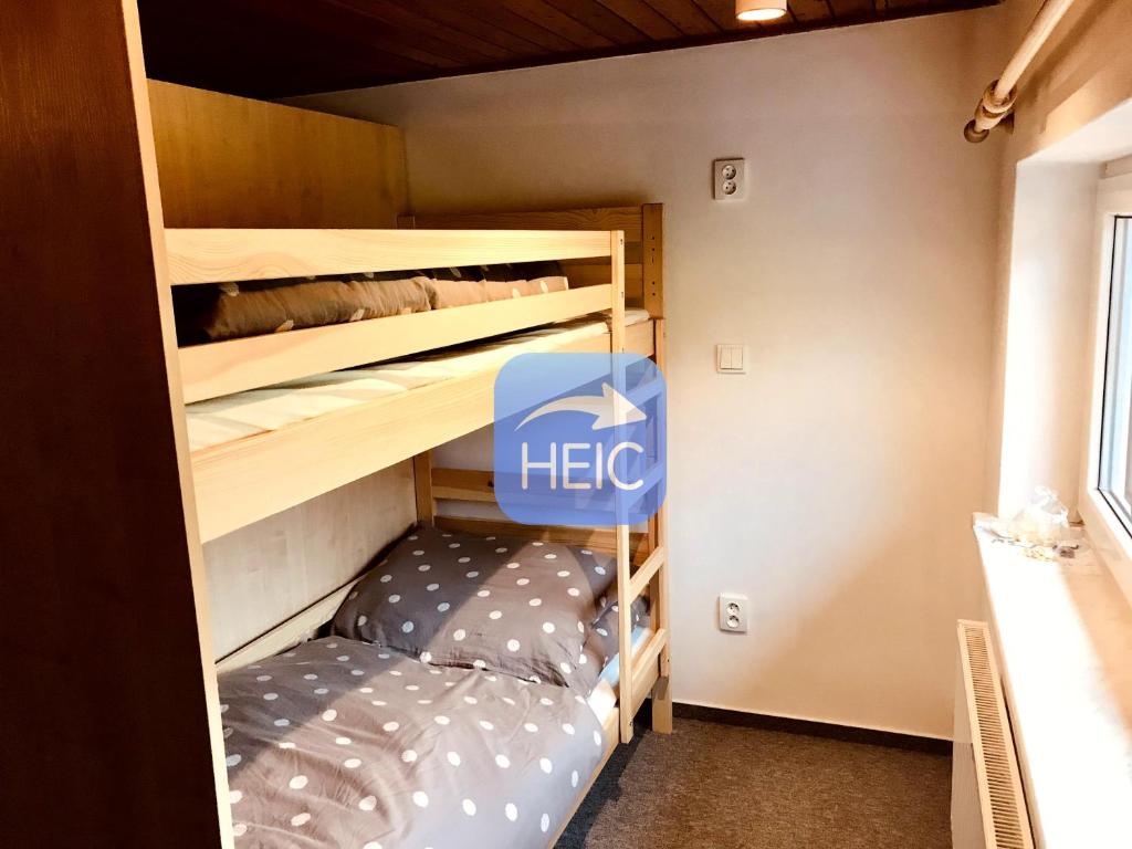 Postel nebo postele na pokoji v ubytování Chata u Chrobáčků na Čeladné