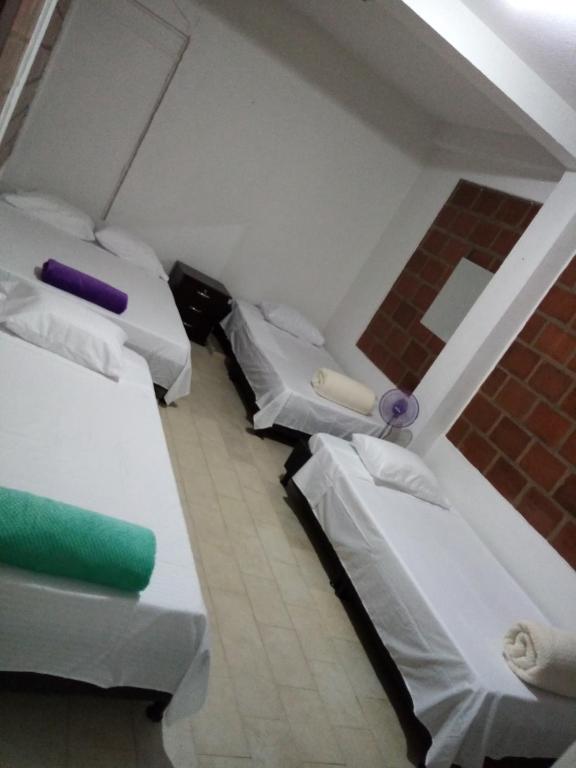 Postel nebo postele na pokoji v ubytování villa roman