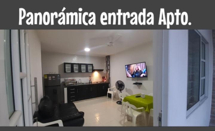 TV a/nebo společenská místnost v ubytování Apartamento JHON