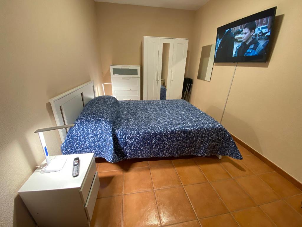 Postel nebo postele na pokoji v ubytování Villa Mogan Mall, con jacuzzi y PlayStation 5