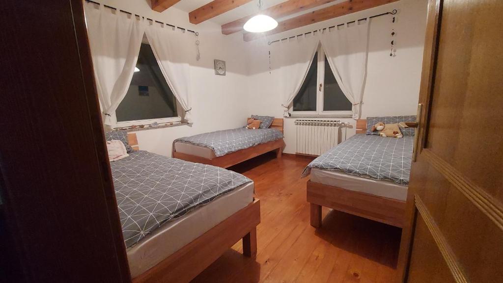 Postel nebo postele na pokoji v ubytování Idealna kuća za odmor, Pale