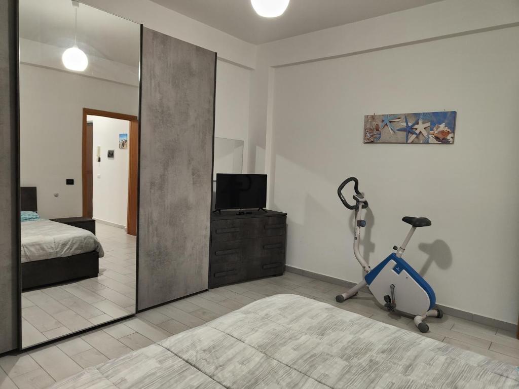 Posteľ alebo postele v izbe v ubytovaní Casa Trezza