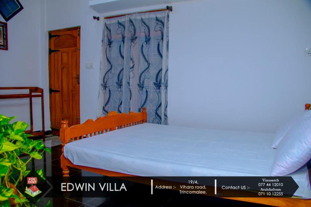 Postel nebo postele na pokoji v ubytování Edwin Villa