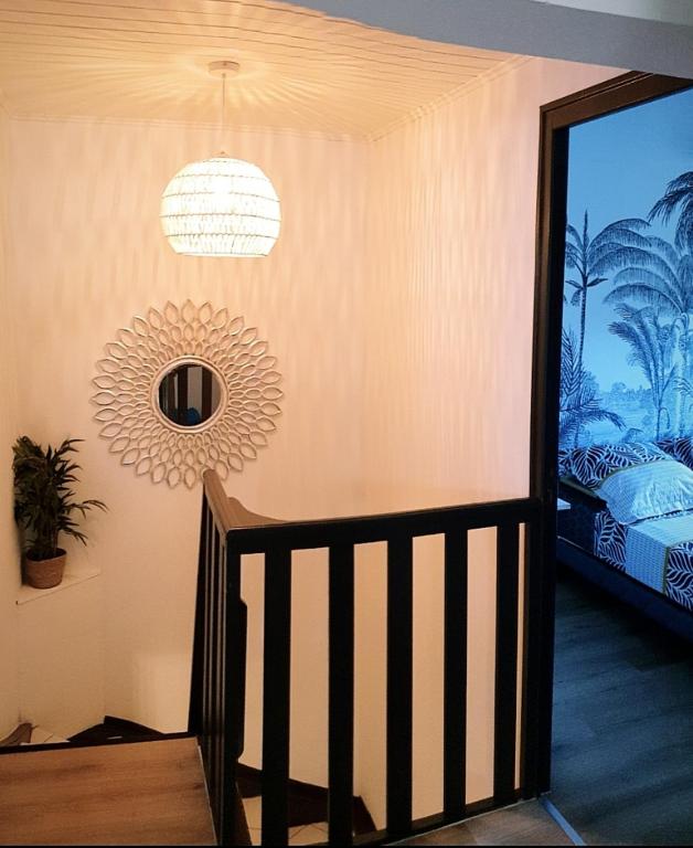 Postel nebo postele na pokoji v ubytování Lilie location langevin
