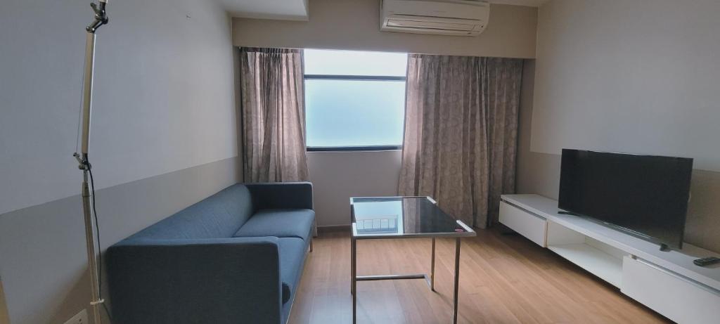 TV a/nebo společenská místnost v ubytování Twenty Three Residence