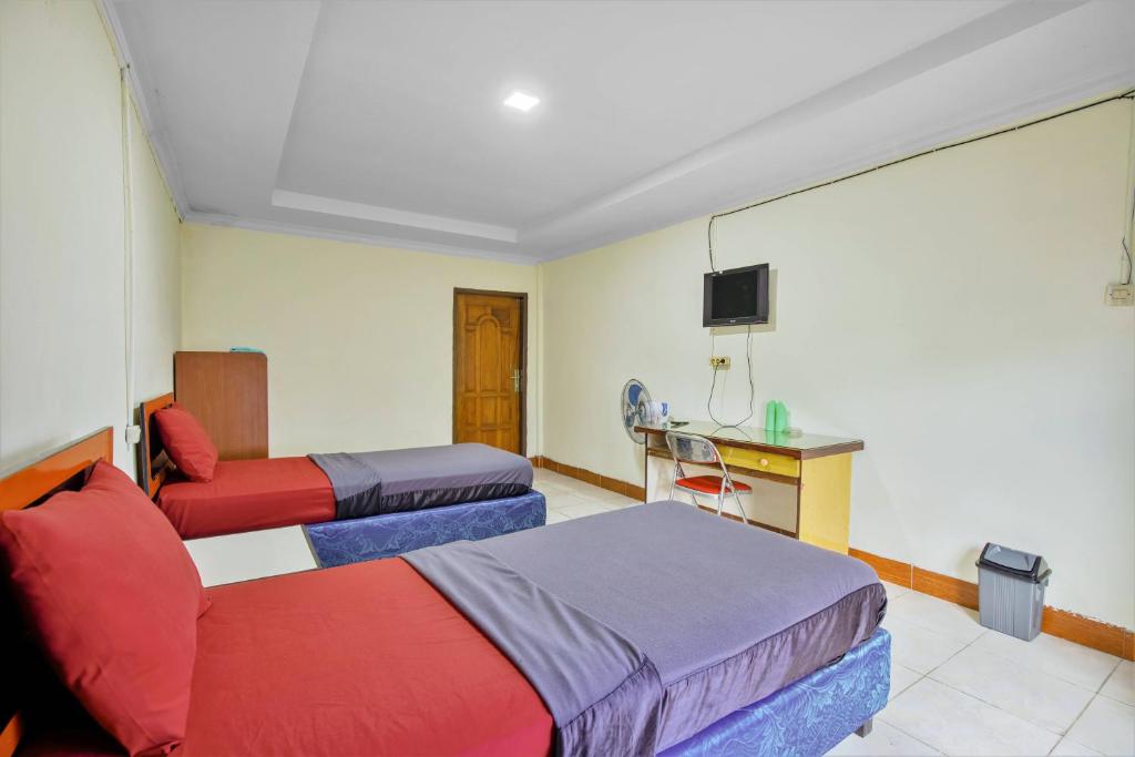 TV a/nebo společenská místnost v ubytování Malibou Hotel Medan