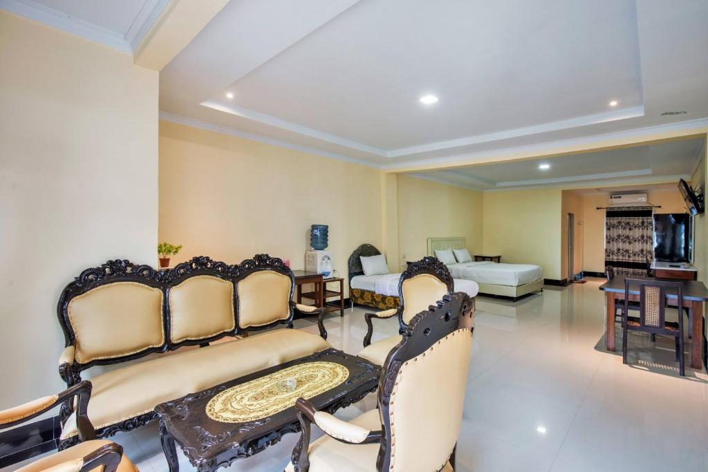 TV a/nebo společenská místnost v ubytování Malibou Hotel Medan