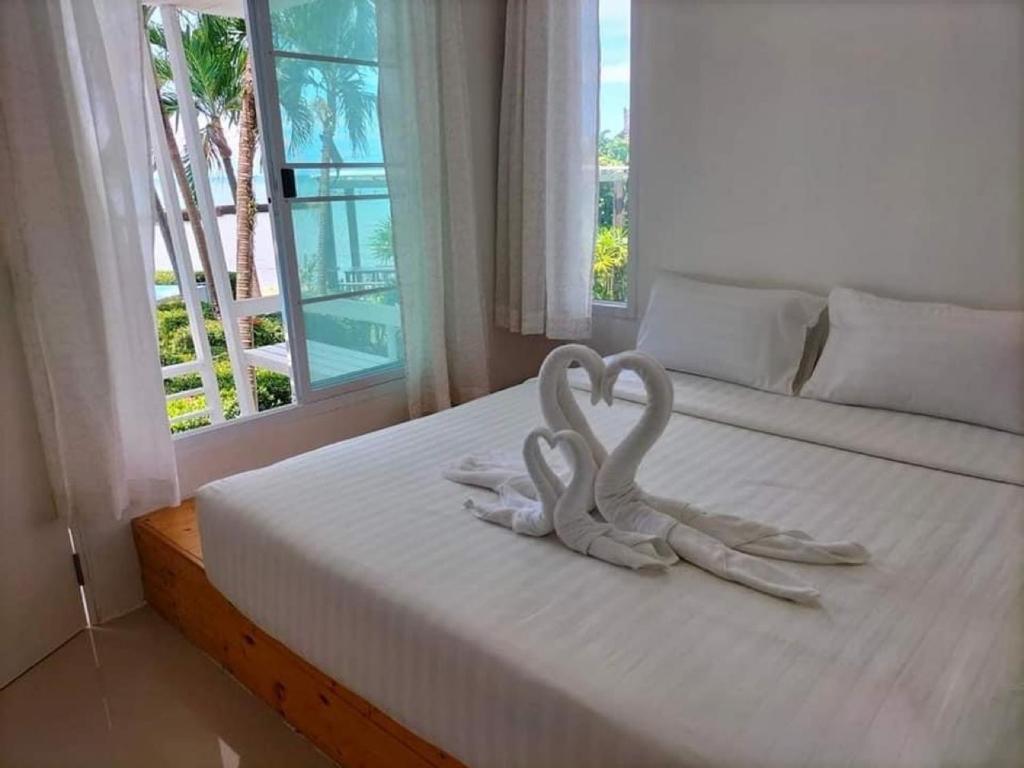 Кровать или кровати в номере White house bailan resort