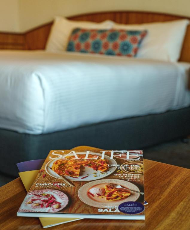 Postel nebo postele na pokoji v ubytování Arkaba Hotel