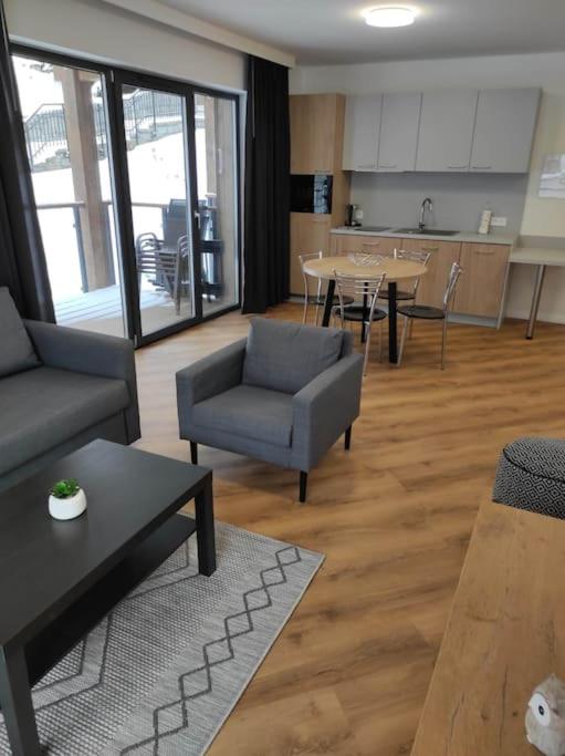 Kuchyňa alebo kuchynka v ubytovaní Apartament 17 SzklarSki