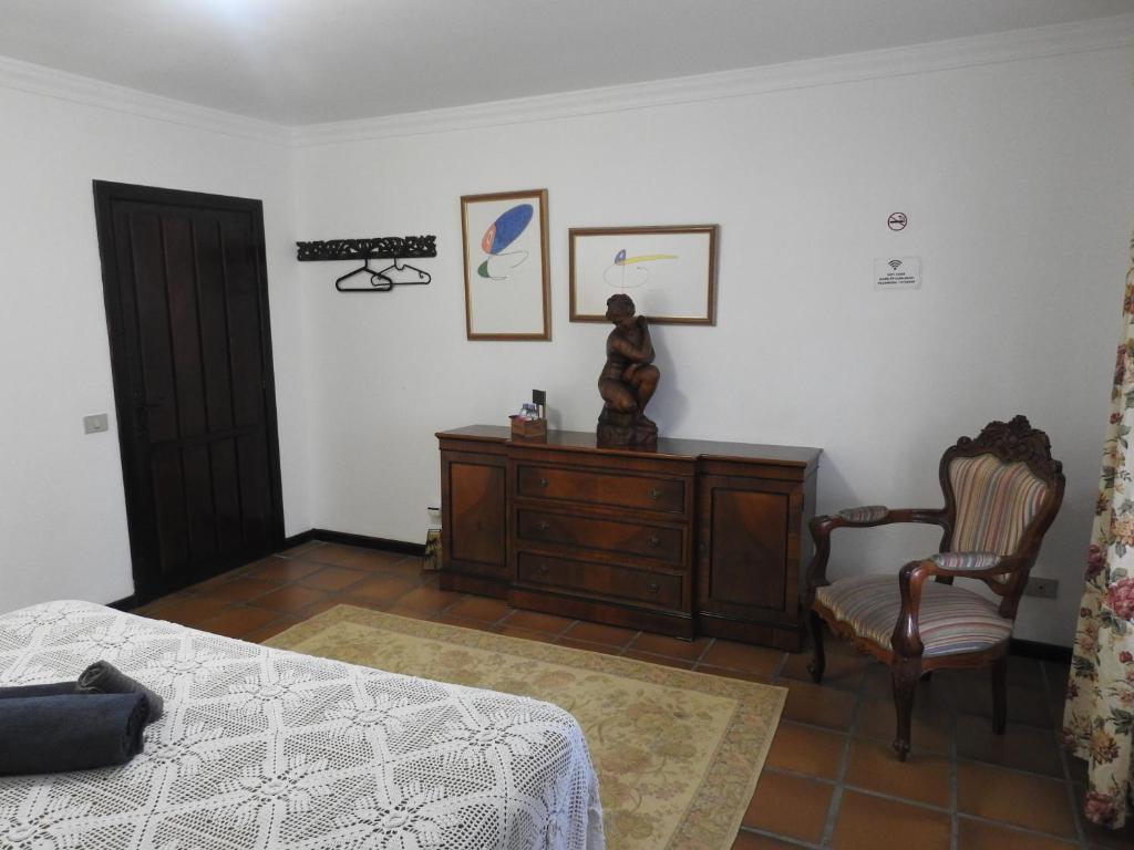 Postel nebo postele na pokoji v ubytování Habitaciones Doña Cris