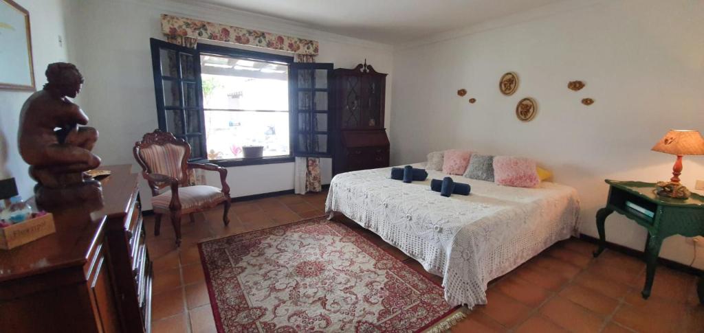 Postel nebo postele na pokoji v ubytování Habitaciones Doña Cris