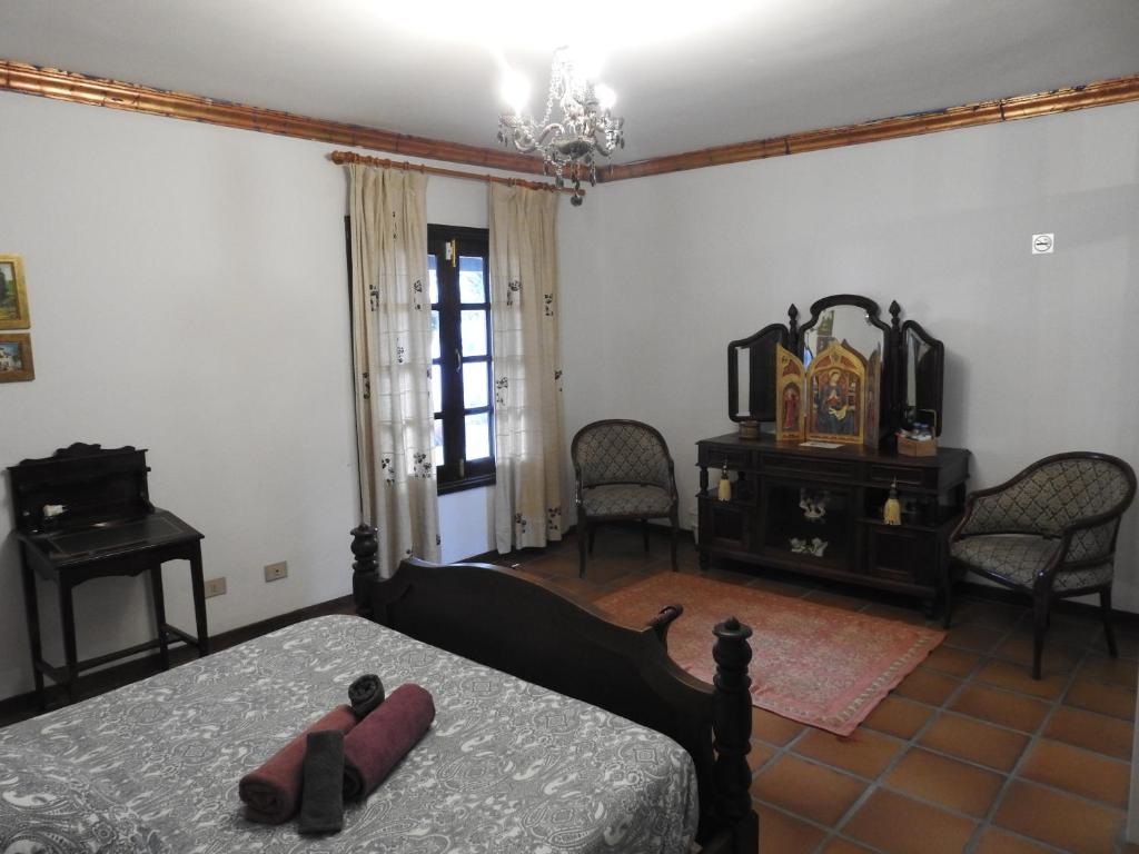 Postel nebo postele na pokoji v ubytování Habitaciones Doña Cris