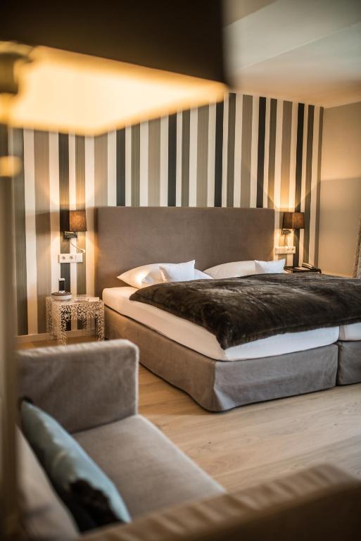 Postel nebo postele na pokoji v ubytování Boutique-Hotel Villa Anna