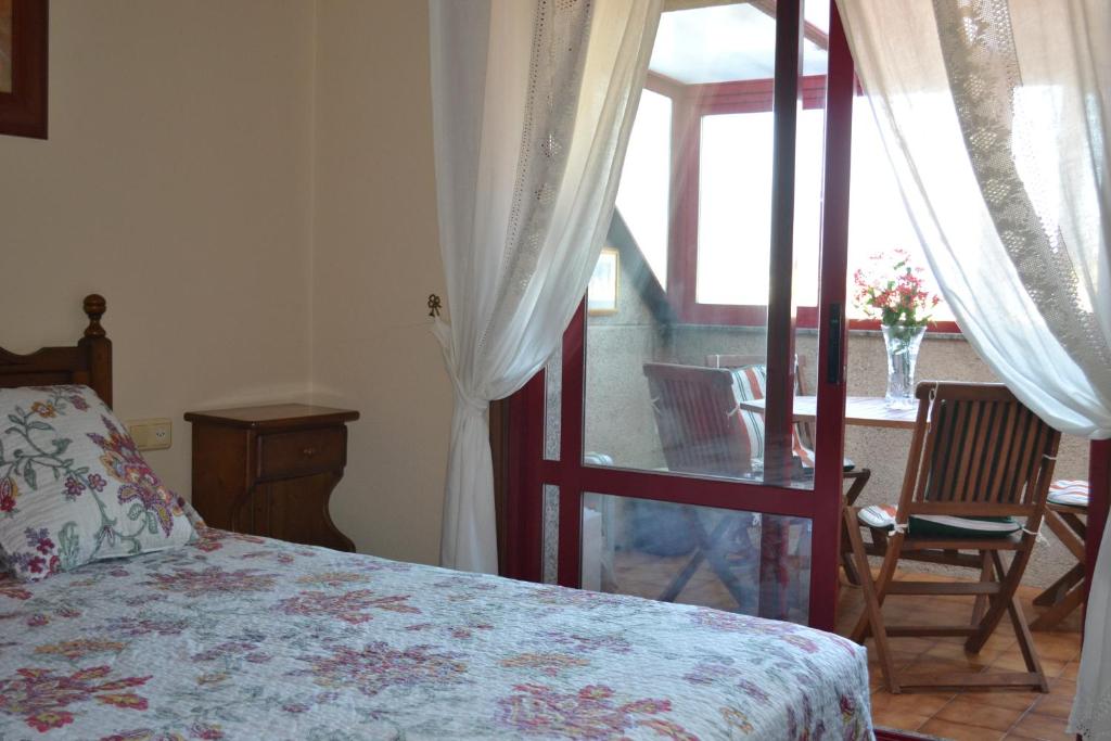 Postel nebo postele na pokoji v ubytování Coqueto Duplex en Vilagarcía de Arousa centro
