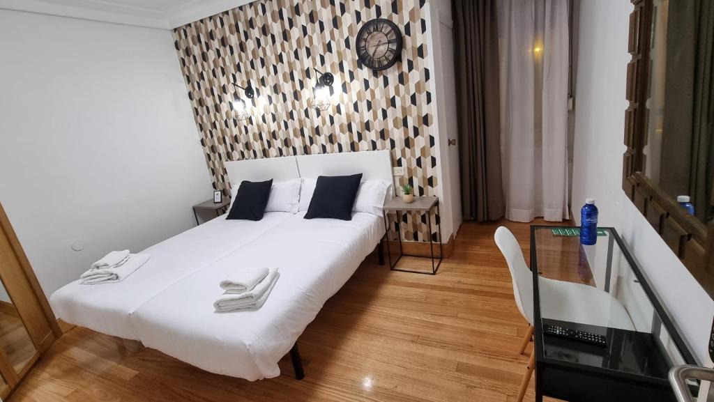 Postel nebo postele na pokoji v ubytování Hotel Norte