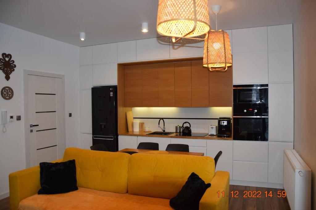 Kuchyň nebo kuchyňský kout v ubytování Apartament Spokojny