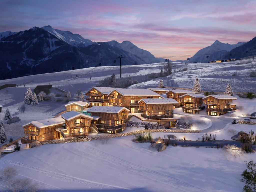 an aerial view of a resort in the snow at Bergdorf Hotel Zaglgut in Kaprun