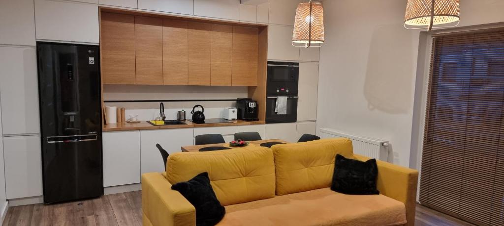 Kuchyň nebo kuchyňský kout v ubytování Apartament Spokojny
