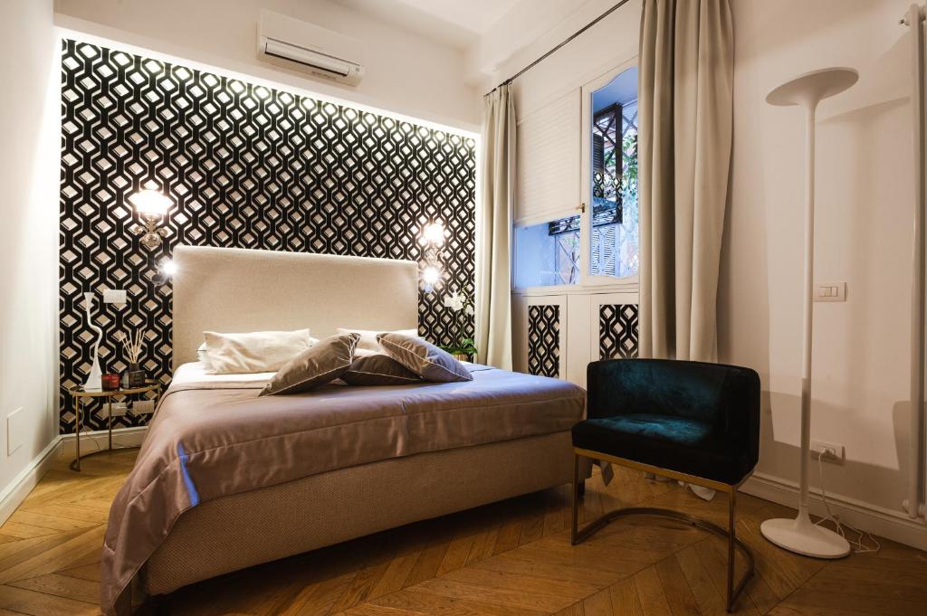 A bed or beds in a room at EBL LUXURY HOME