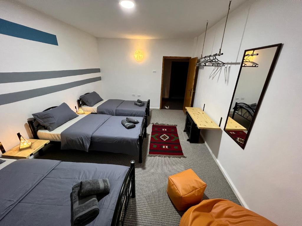 Ένα ή περισσότερα κρεβάτια σε δωμάτιο στο Euphoria guest house