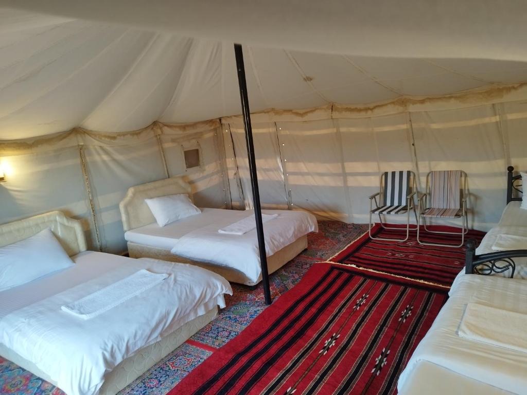 Postel nebo postele na pokoji v ubytování Sands Dream Tourism Camp