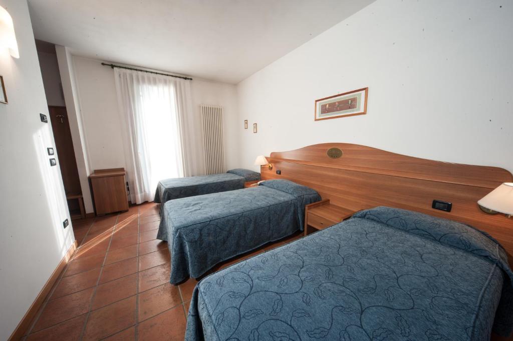Postel nebo postele na pokoji v ubytování La Vigneta