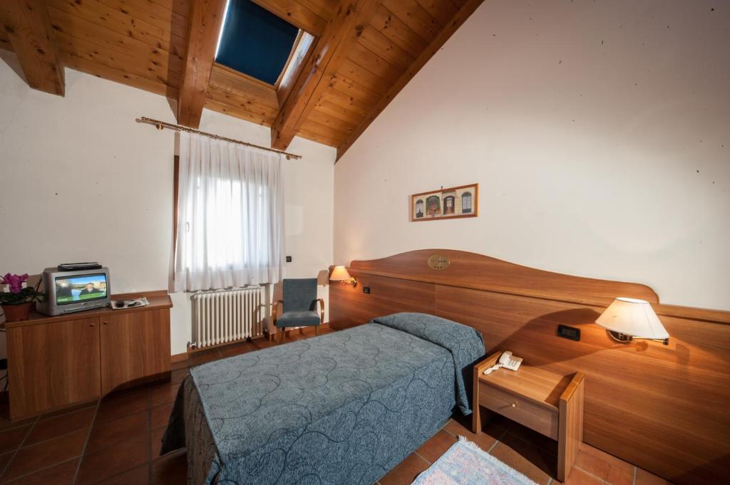Postel nebo postele na pokoji v ubytování La Vigneta