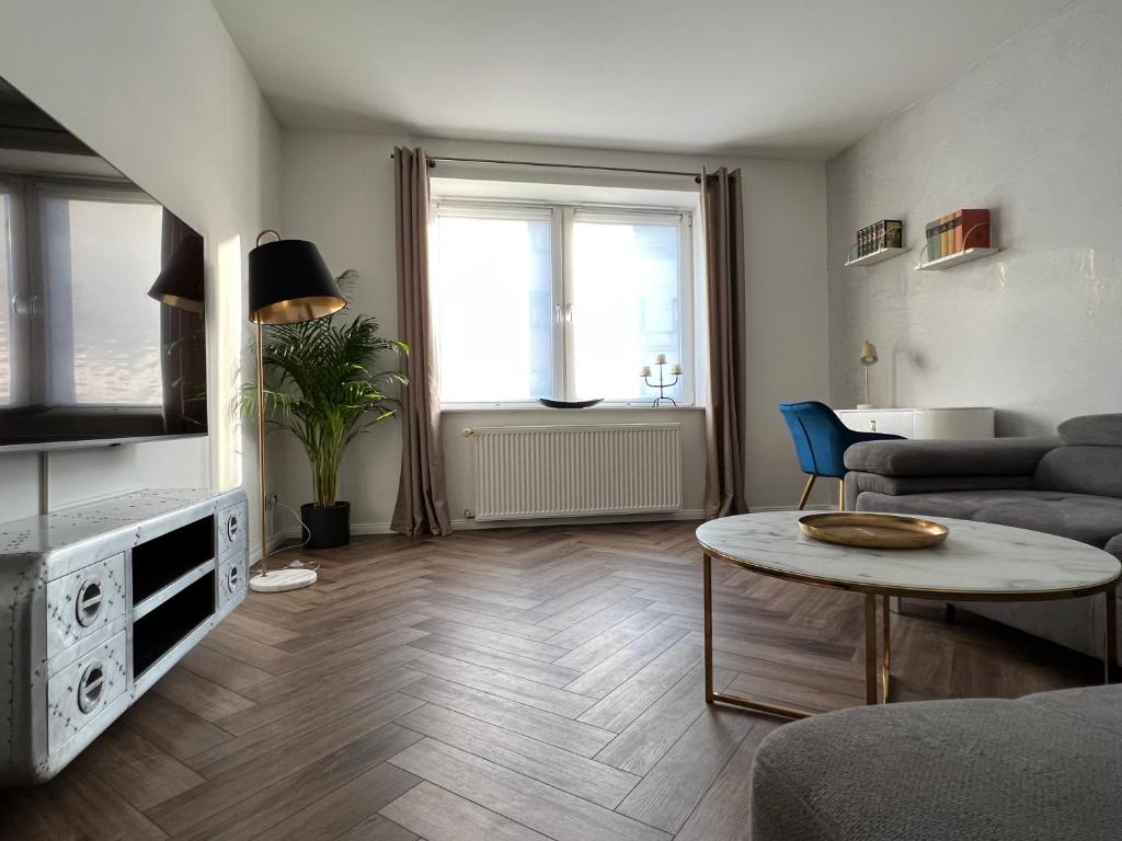 Posezení v ubytování EXKLUSIVE 2 Zimmer EG Wohnung mit Balkon in Top Lage!