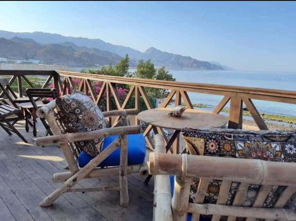 a table and a chair and a table and a table and a table at SHANTY HOUSE in Dahab