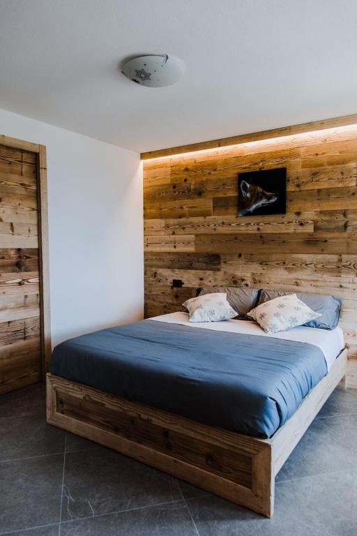 Postel nebo postele na pokoji v ubytování Atelier della Montagna