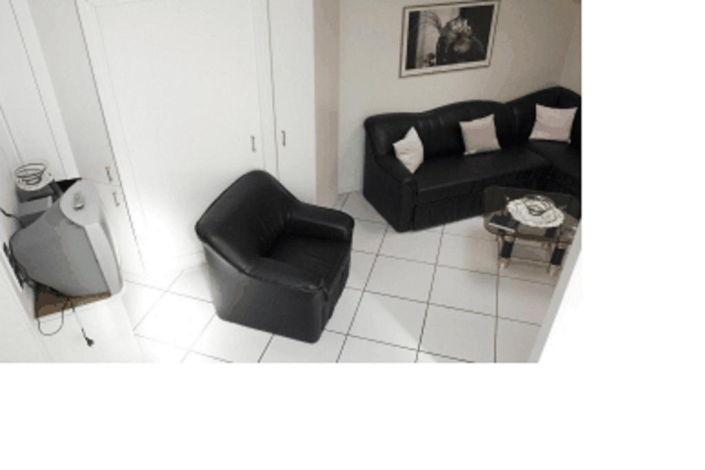 Posezení v ubytování Hotel am Schenkelberg