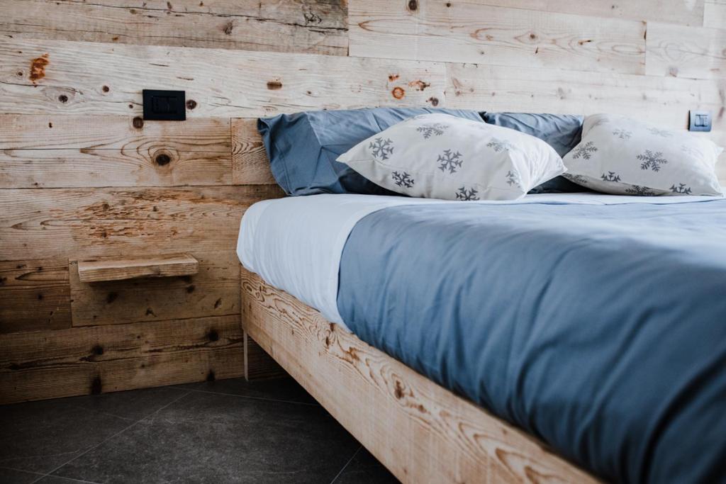 Postel nebo postele na pokoji v ubytování Atelier della Montagna