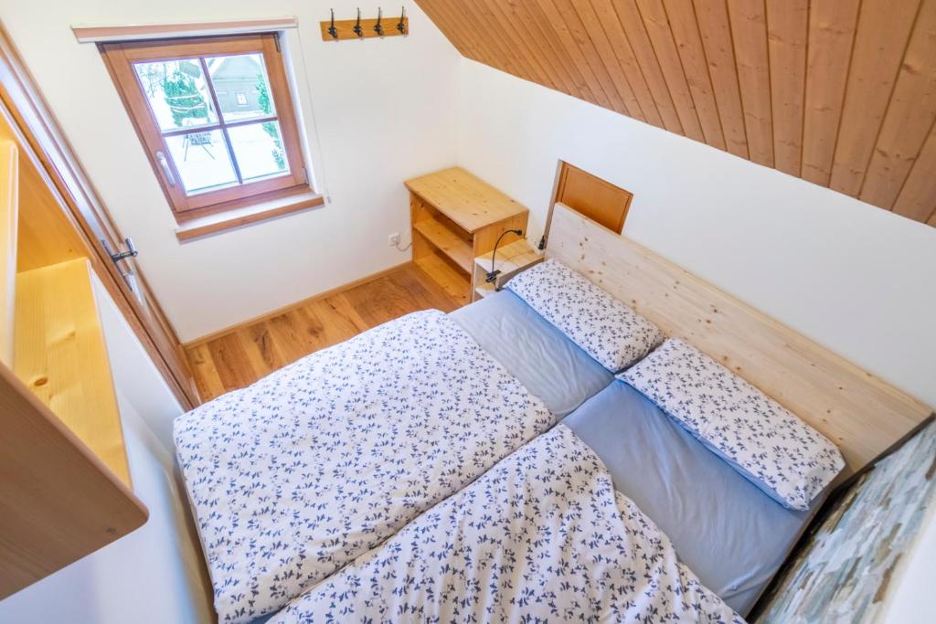 En eller flere senge i et v&aelig;relse p&aring; Ferienhaus Alte M&uuml;hle Hohentauern
