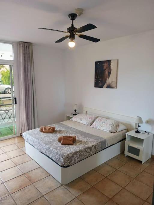 Posteľ alebo postele v izbe v ubytovaní Casa de Simo · Sol, Relax y diversión