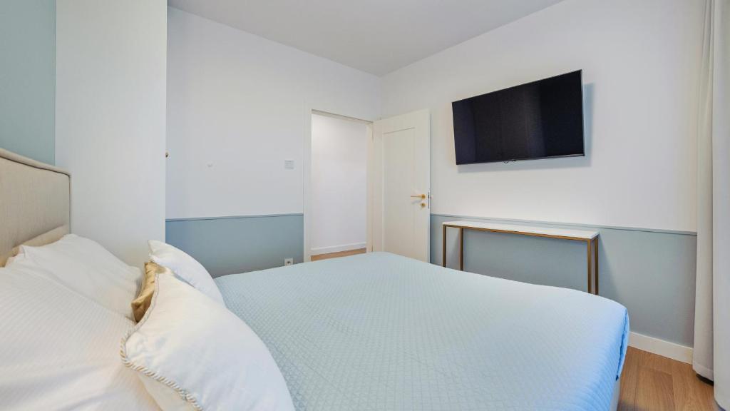 Postel nebo postele na pokoji v ubytování Apartament Lux Tukan B004, Polanki Aqua - Holiday City