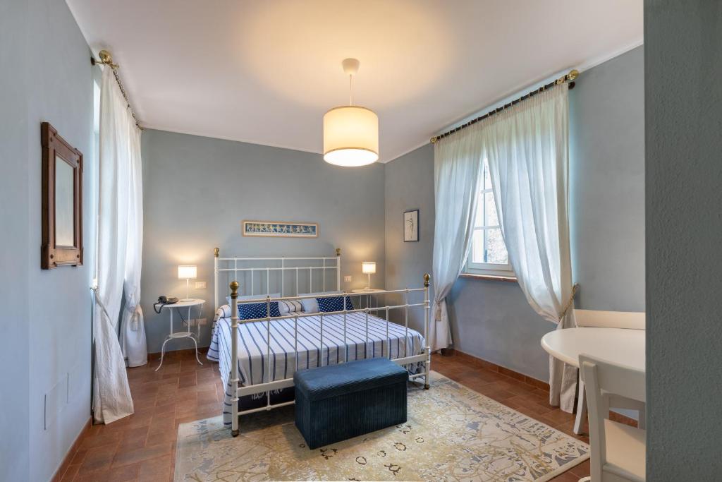 Postel nebo postele na pokoji v ubytování Altra Meta b&b