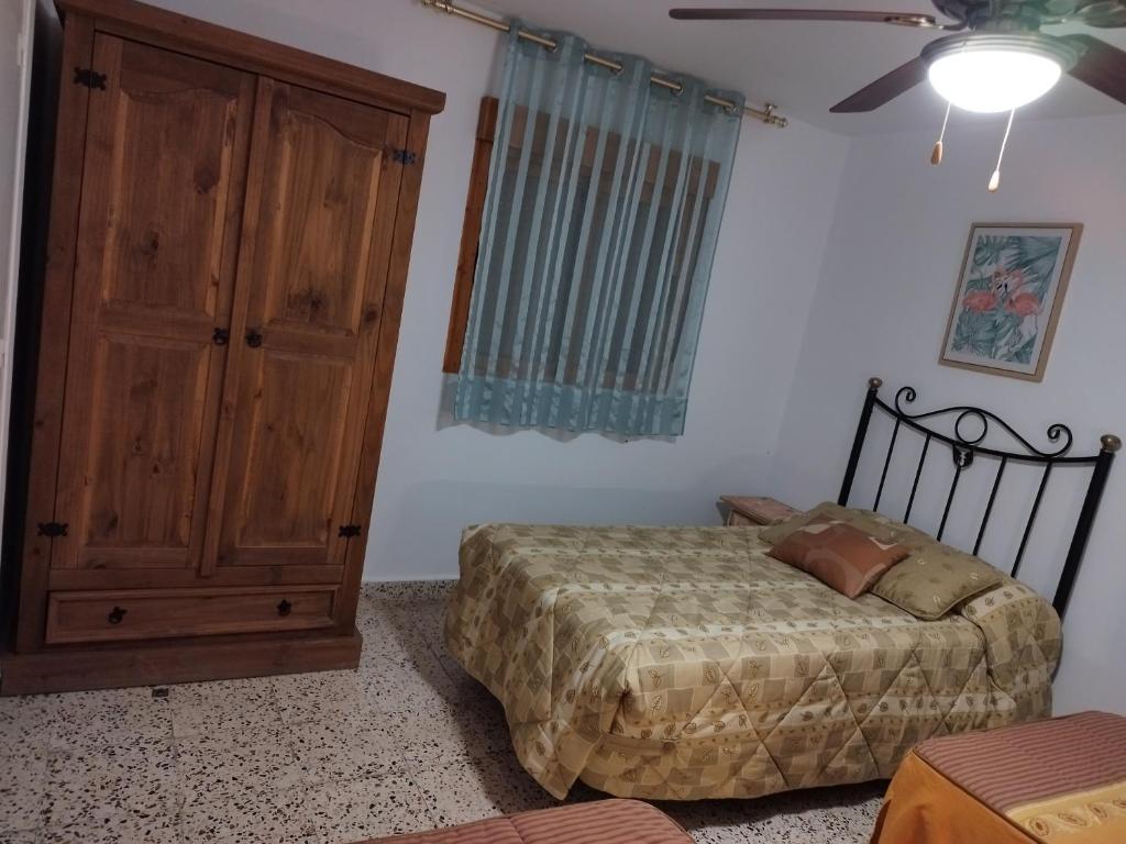 Posteľ alebo postele v izbe v ubytovaní Casa Río Quentar