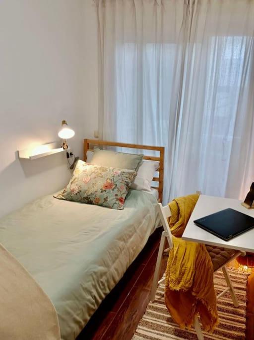 Postel nebo postele na pokoji v ubytování Confortable apartamento en pueblo costero
