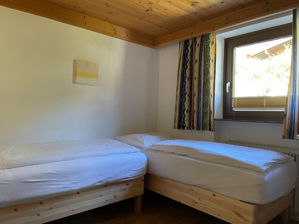 Posteľ alebo postele v izbe v ubytovaní Appartments-Hutter