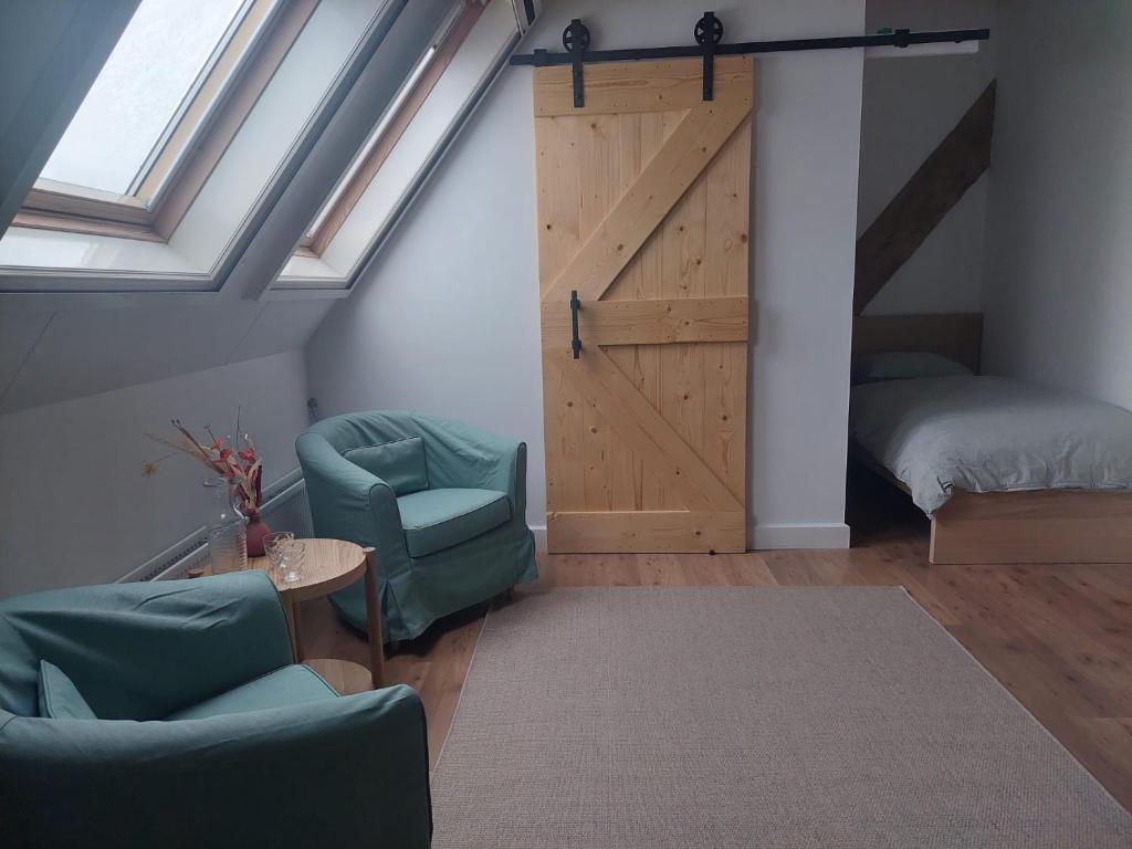 Posezení v ubytování B&B Wijdzicht