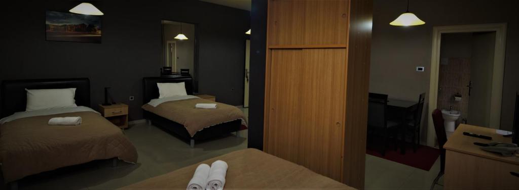 Postel nebo postele na pokoji v ubytování Hotel Ambasador