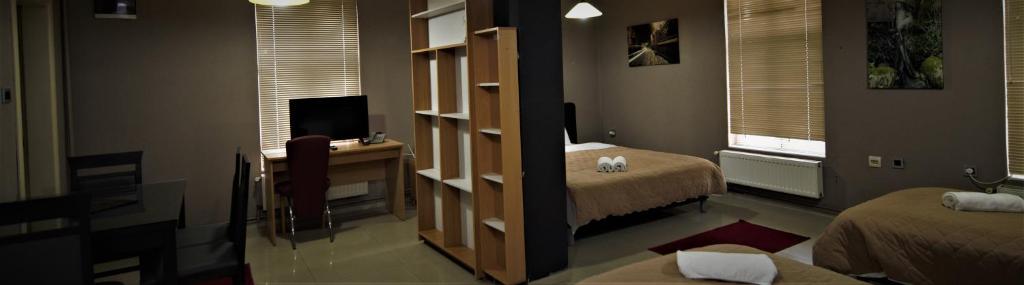 Postel nebo postele na pokoji v ubytování Hotel Ambasador