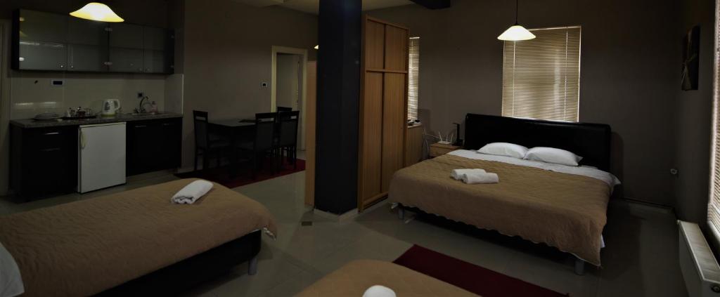 Postel nebo postele na pokoji v ubytování Hotel Ambasador