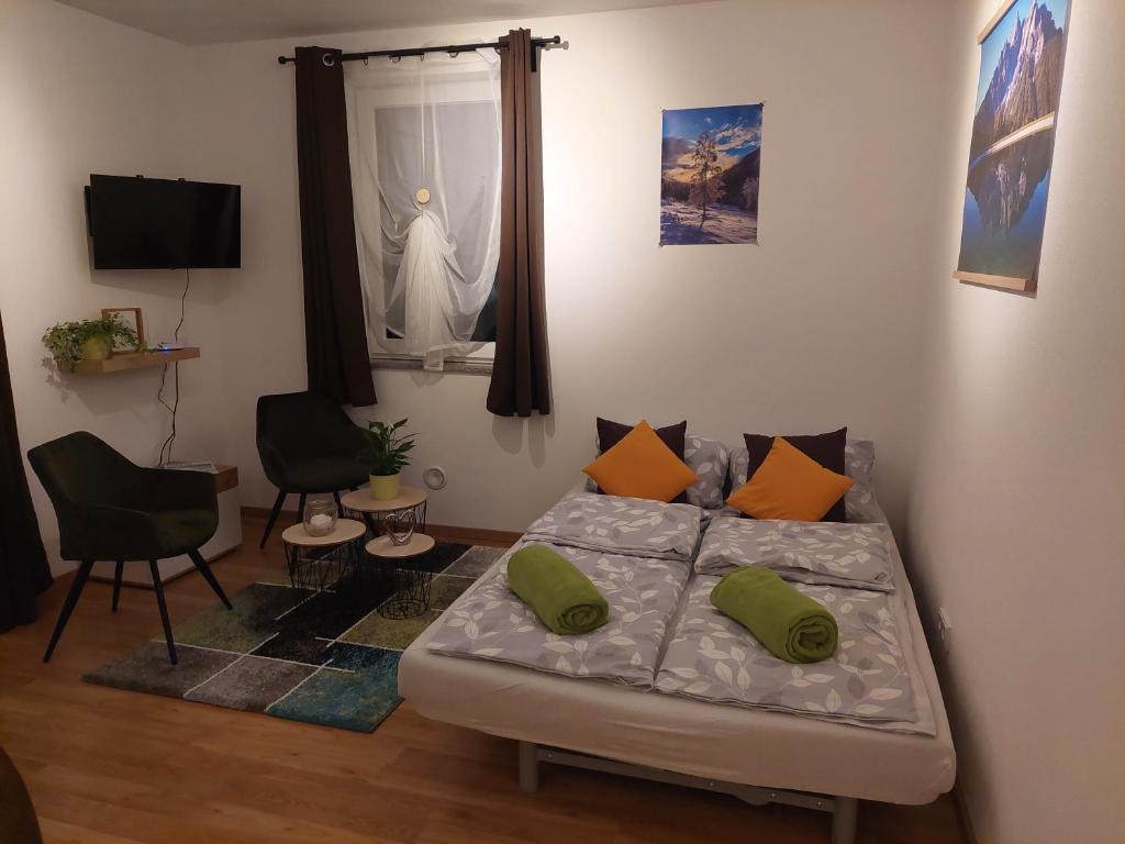 A bed or beds in a room at Appartement Naturnah
