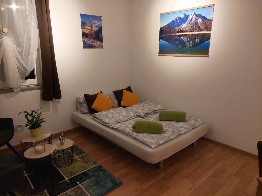 A bed or beds in a room at Appartement Naturnah