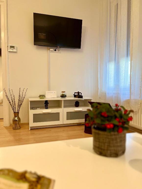 Telewizja i/lub zestaw kina domowego w obiekcie The Downtown Pearl