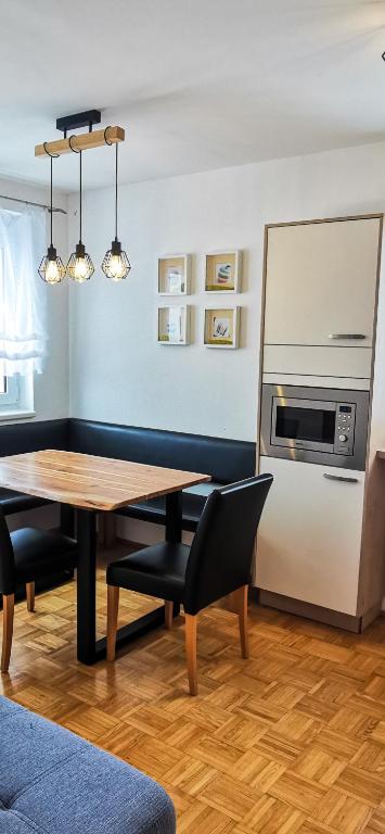 Kuchyň nebo kuchyňský kout v ubytování Apartments Bergblick