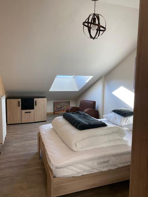 Posteľ alebo postele v izbe v ubytovaní Le Martin Pêcheur - Appartement