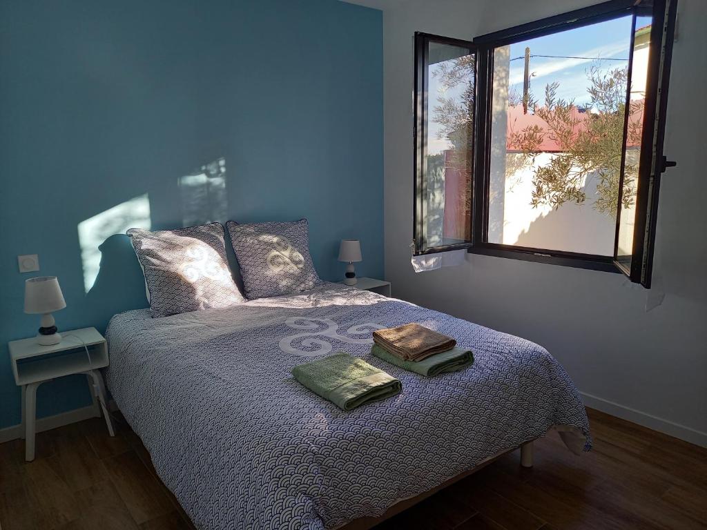 Postel nebo postele na pokoji v ubytování Villa l'oeillet des dunes